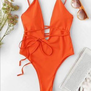 orange plunge tie one piece